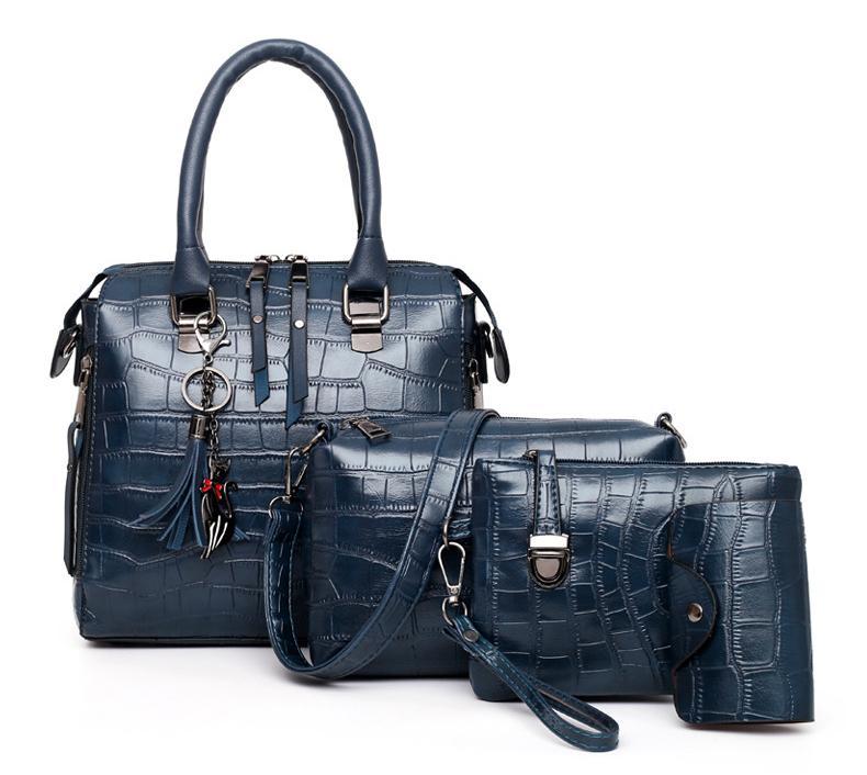Valentina® | SET TASCHEN VAN HANDGEVEREID LEDER MET 4 DELEN