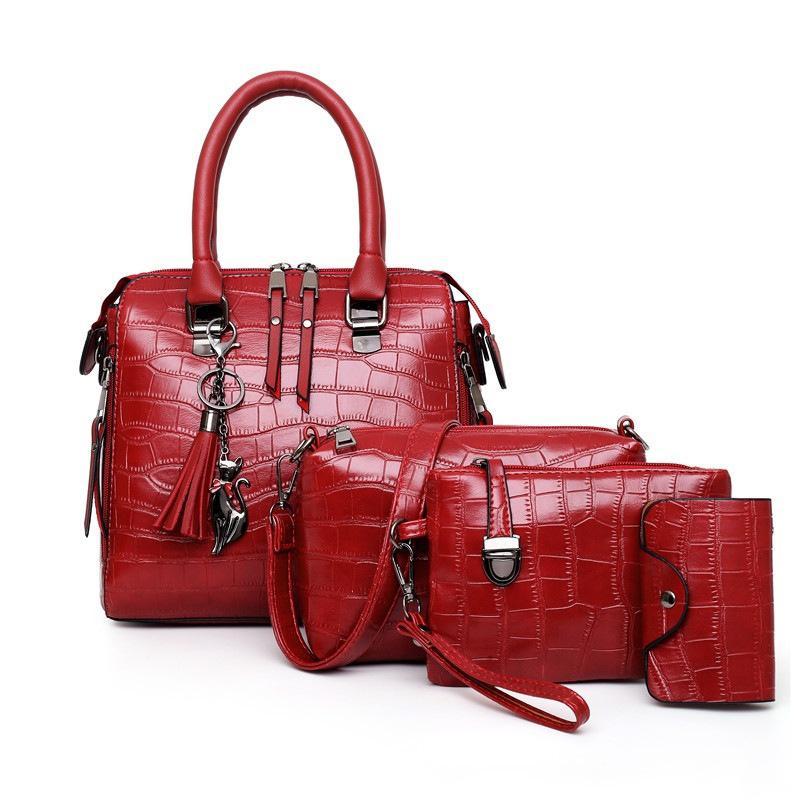 Valentina® | SET TASCHEN VAN HANDGEVEREID LEDER MET 4 DELEN