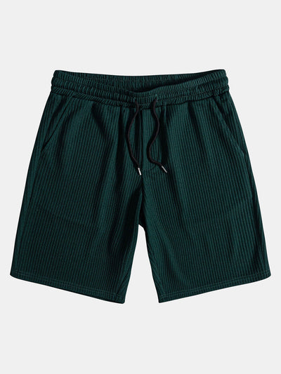 Overhemd en korte broek met nerveuze knoop