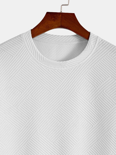 Gestreept jacquard T-shirt met korte mouwen en een gebogen zoom