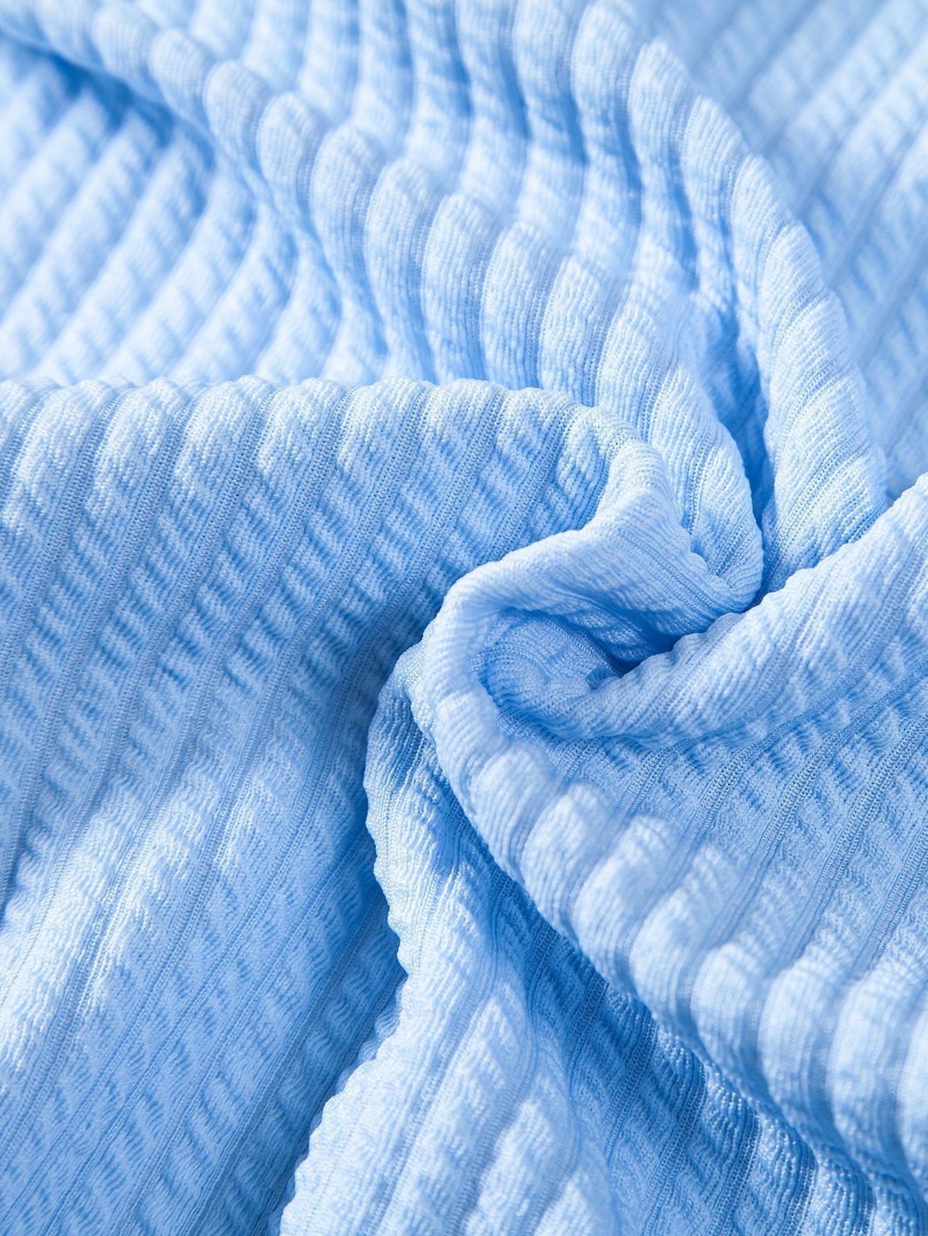 Overhemd en korte broek met nerveuze knoop