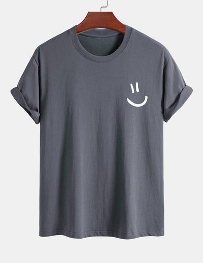 T-shirt van katoen met een smiley print in reguliere pasvorm