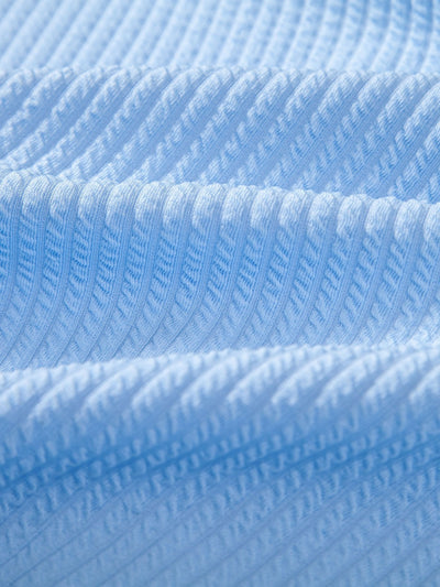 Overhemd en korte broek met nerveuze knoop